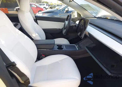 2022 Tesla Model Y из США, поврежденный, VIN 7SAYGDEE8NF491892